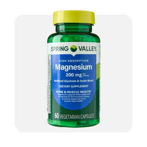 Green bottle of Spring Valley magnesium 200 milligrams, 60 vegetarian capsules, supports bone and muscle health.
